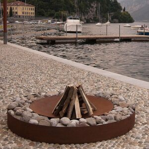 AK47 Zen fire pit next to Italian lake