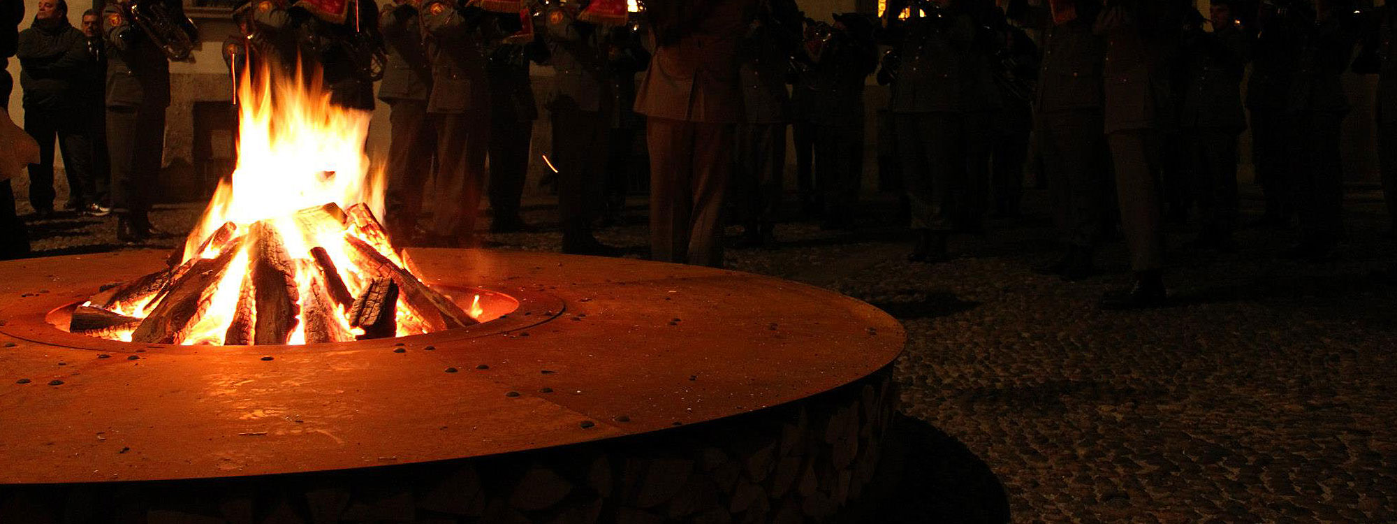 Image of flaming embers held within Zero circular fire pit by AK47 Design