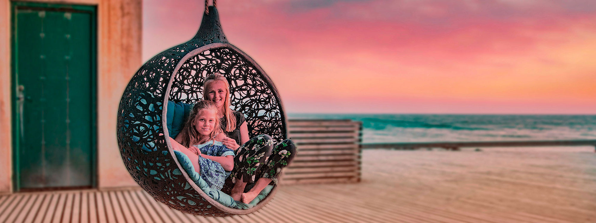 Image of couple of young girls snuggled up in Bios Mini swing chair by Unknown Nordic