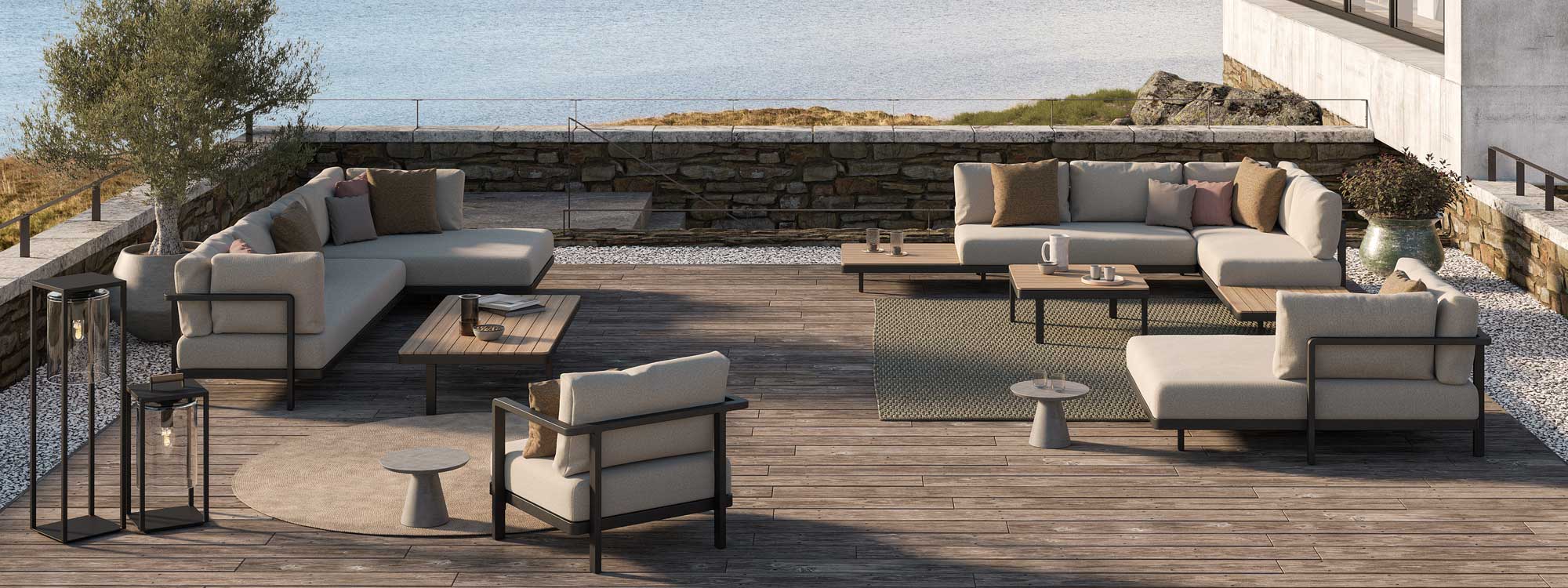 Image of 3 Alura Lounge designer garden corner sofas by Royal Botania on large wooden decked terrace
