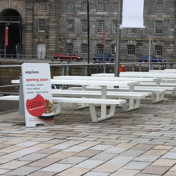 White Cassecroute MODERN Picnic Table & LUXURY PICNIC FURNITURE At Wagamama Restaurant, Plymouth Historic Dockyard. SHORT Or LONG Picnic Table Sizes Up To 14m Made In High QUALITY Picnic Furniture Materials. Cassecroute DESIGNER Picnic FURNITURE Designed By Ronald Mattelé.