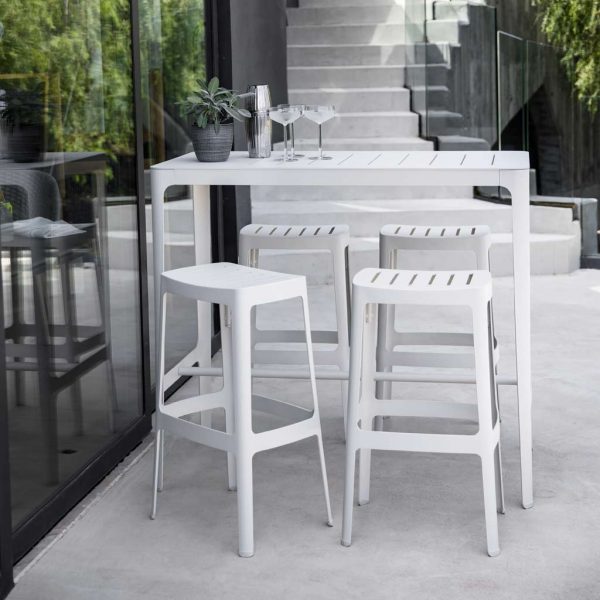 Cut modern outdoor bar furniture is a minimalist exterior bar set in all-weather furniture materials by Cane-line garden furniture company