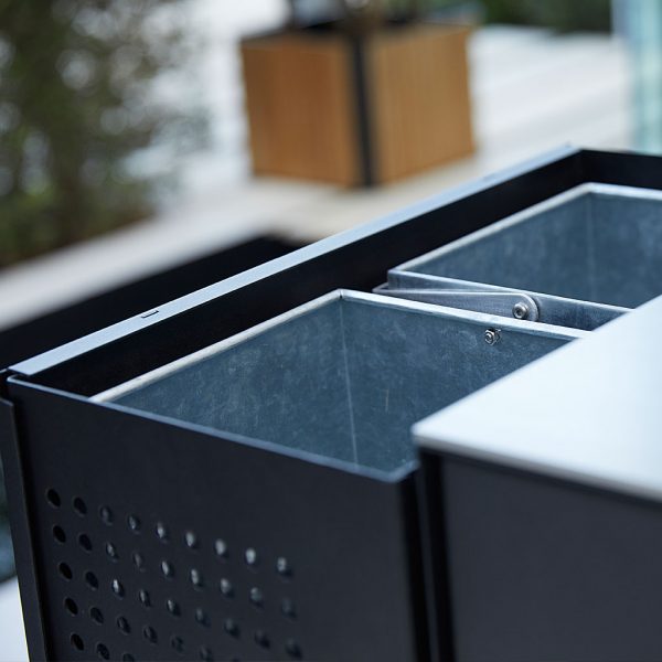 Image of detail of Drop Kitchen's removable galvanised steel rubbish bin insert by Cane-line