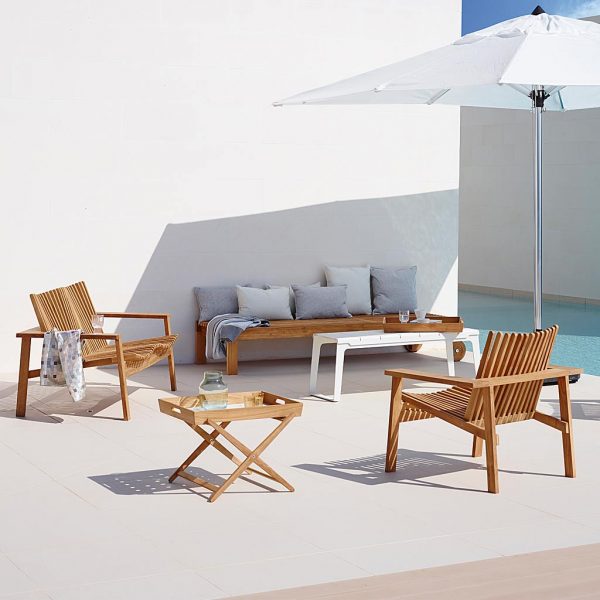 Amaze teak garden lounge furniture includes modern outdoor low chair & garden sofa in luxury teak furniture materials by Cane-line garden furniture.