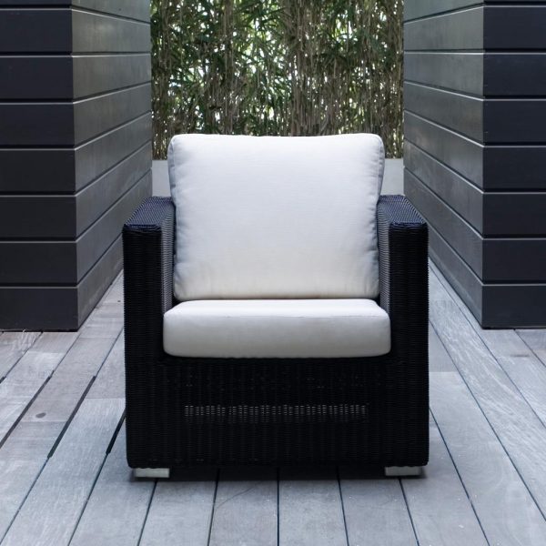 Image of Chester black garden lounge chair with white cushions by Cane-line
