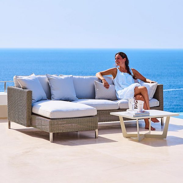 Image of Connect 2 seat sofa module and Connect chaise longue in taupe Cane-line weave with white cushions