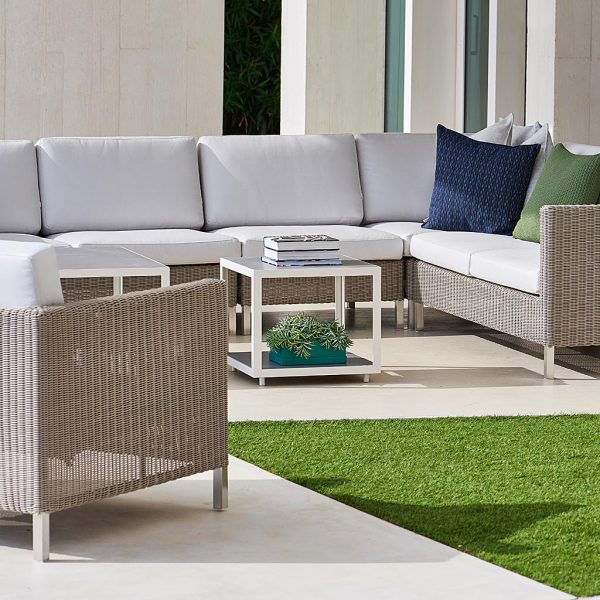 Connect rattan garden sofa is a modular outdoor sofa in low maintenance garden furniture materials by Caneline furniture company.