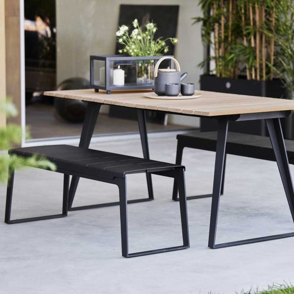 Image of Copenhagen dining table and benches in Lava-Grey aluminium and teak by Caneline garden furniture