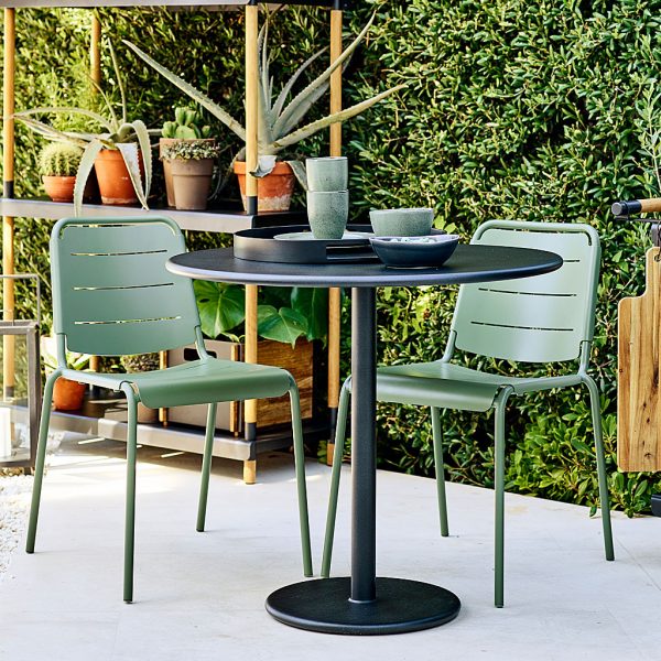 Image of olive Copenhagen garden chairs and Go bistro table by Caneline