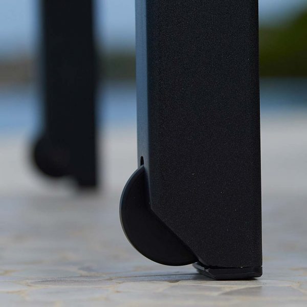 Image of detail of concealed wheels in back legs of Relax dark-grey sun lounger by Cane-line