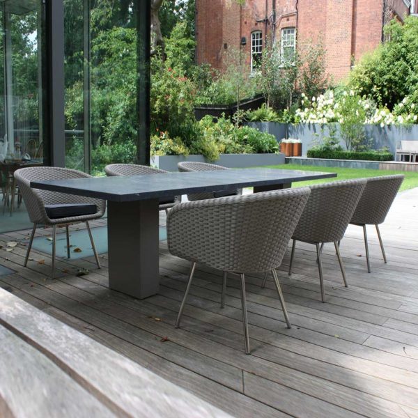 Image of Doble large modern rectangular garden table and Shell tub garden chairs by FueraDentro