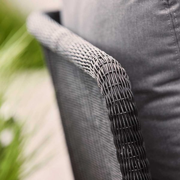 Image of detail of black Cane-line Weave synthetic rattan and grey cushions used on Horizon garden sofa by Caneline