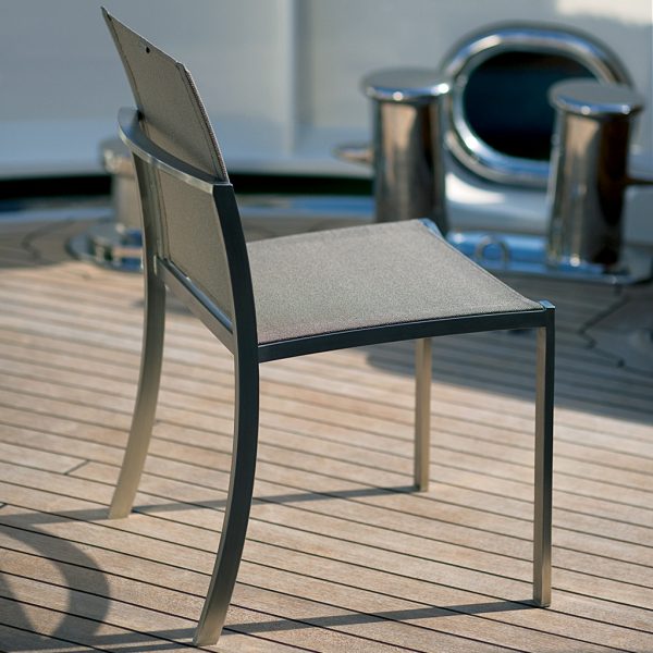 Image of Royal Botania OZON chair in electro-polished stainless steel and cappuccino on deck of yacht