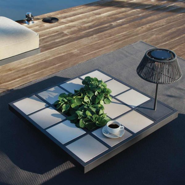 Mozaix garden tables by Royal Botania are notable for the glazed tiles that are inserted to create the table top.