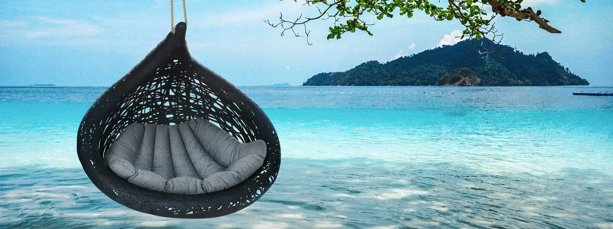 Image of Bios Lucid swing seat by Unknown Nordic with azure sea in background