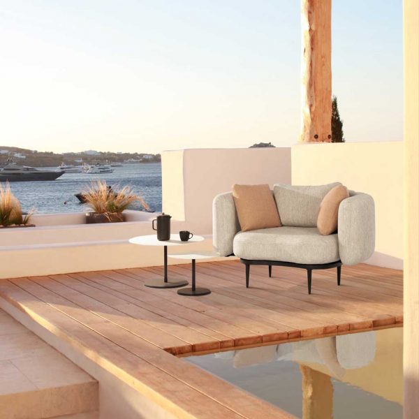 Image of Royal Botania Organix lounge chair and Butler side tables on decking next to plunge pool