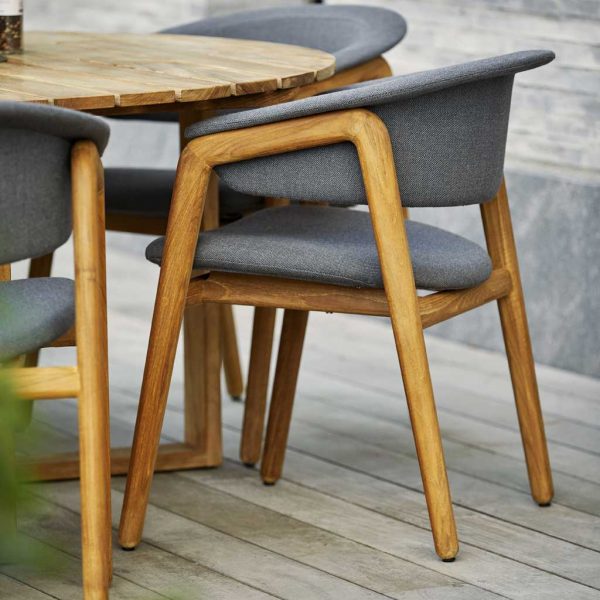 Image showing carefully crafted teak frame and grey upholstery of Cane-line Luna garden chair