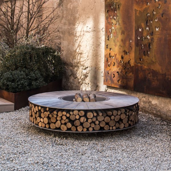 Zero Aluminium fire pit is a silver coloured firepit & unique garden sculpture with firepit log store in high end firepit materials by AK47.