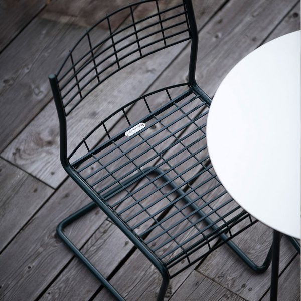 Birdseye view of High Tech cantilever garden chair in Black steel which has industrial design by Grythyttan Stålmobler