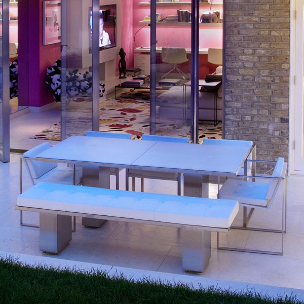 Doble minimalist garden dining furniture includes an architectural garden table & linear garden chairs by FueraDentro modern garden furniture
