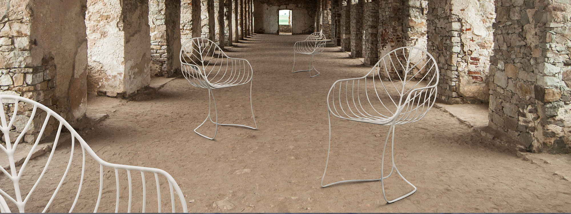 Image of white Folia chairs by Royal Botania in dilapidated cloister