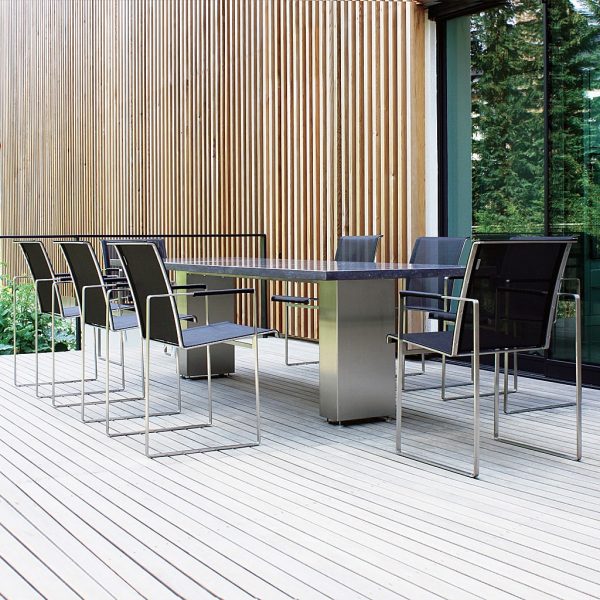 Doble modernist garden dining furniture includes an architectural garden table & linear garden chairs by FueraDentro modern garden furniture