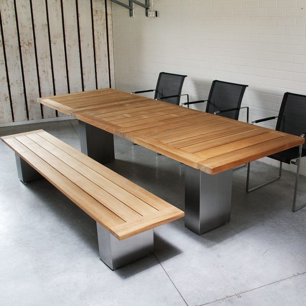 Image of Doble linear garden table and bench with stainless steel bases and teak surfaces
