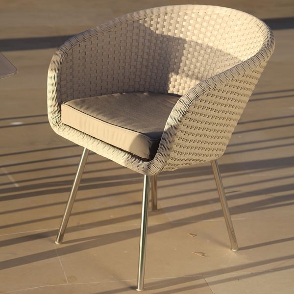 Image of Shell woven white retro garden chair with stainless steel legs by FueraDentro