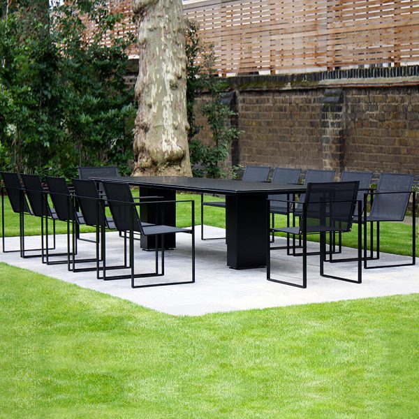 Image of Doble and Butaque modern black garden dining furniture in London back garden