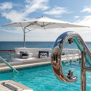 White & Polished Aluminium Tuuci Ocean Master Max Cantilever Parasols On Superyacht. Modern Cantilever Parasols In Marine Grade Parasol Materials. Residential, Hospitality And Hotel Parasols.