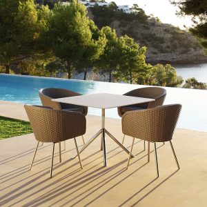 Shell modern garden furniture & retro outdoor dining furniture includes a very comfortable tub chair by FueraDentro woven garden furniture.