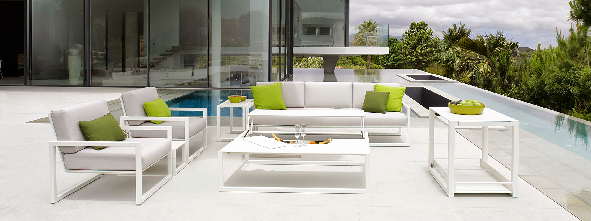 Image of white Ninix garden sofas with white upholstery by Royal Botania