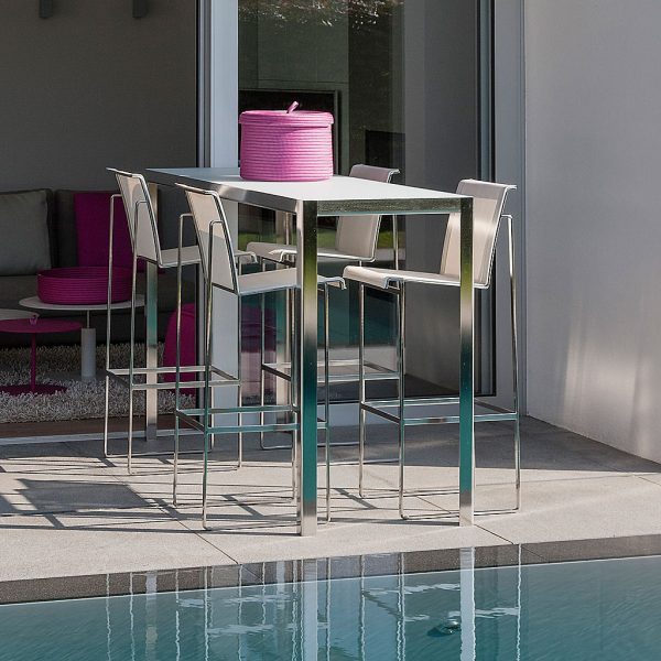 Nimio modern stainless steel bar furniture is a minimalist outdoor bar set & linear design bar stool by FueraDentro luxury garden furniture.