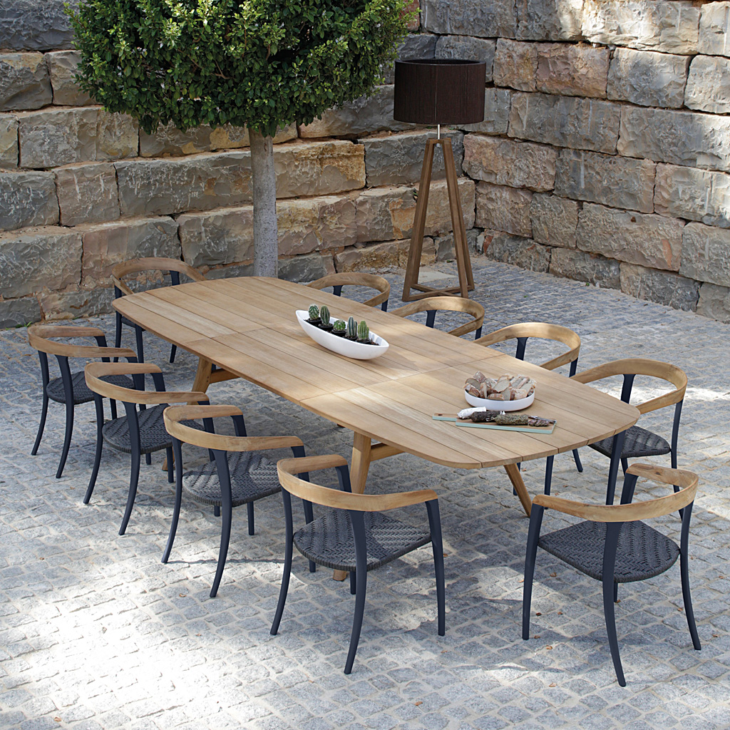Image of Zidiz extending teak table and Jive chairs in anthracite and teak by Royal Botania