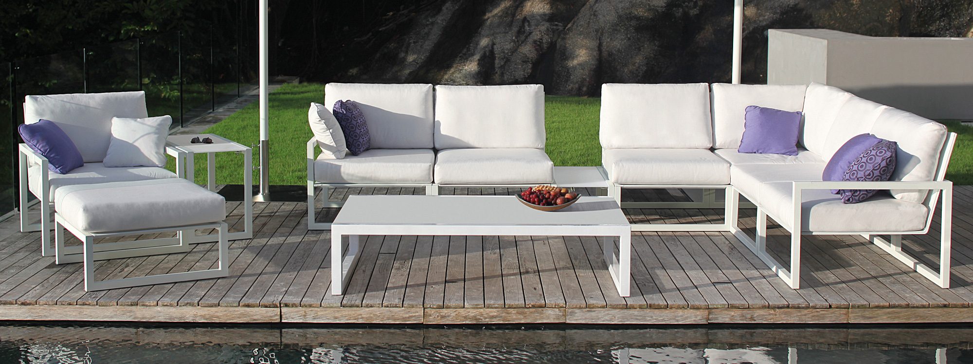 Image of white Ninix outdoor furniture on decking by Encompassco