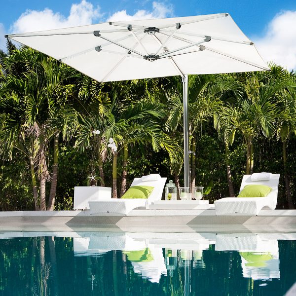 Poolside View Of Tuuci Ocean Master Max Cantilever Parasols. Modern Cantilever Parasols In Marine Grade Parasol Materials. Residential, Hospitality And Hotel Parasols.