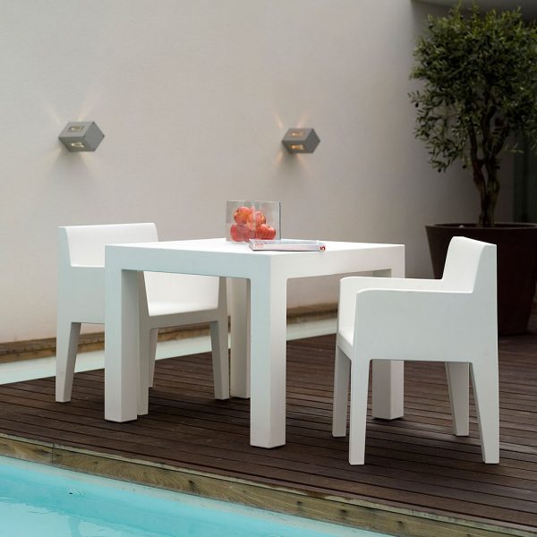 Image of Vondom Jut square garden table and 2 modern garden carver chairs in white roto-molded polyethylene