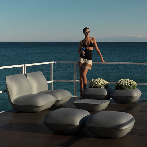 Image of steel-coloured Vondom Pillow exterior lounge furniture on waterside balcony