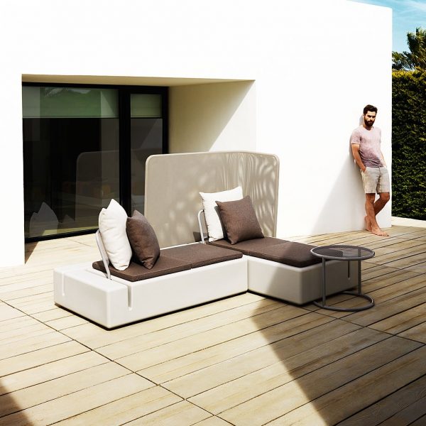 Image of Kes small garden corner sofa by Vondom on sunny terrace