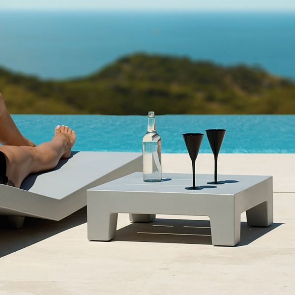 Grey Low Table & JUT Modern GARDEN Furniture Sun Lounger Is A Minimalist SUNBED, LOW MAINTENANCE Sun Lounger, Hotel Sun Lounger By VONDOM Modern Contact Furniture.