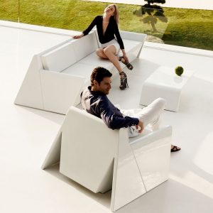 Couple Relaxing On White Lacquered REST Modern MODULAR Garden SOFA, ALL WEATHER Sofa Designed By A-cero - Spain. REST CONTEMPORARY Outdoor Sofas Are Made In HIGH QUALITY Outdoor Sofa Materials And Are Supplied By Vondom LUXURY Exterior Furniture Co.