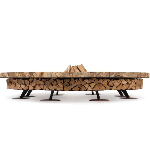 Studio image of side view of rain forest brown Ercole fire pit by AK47, with the built-in log store full of stacked firewood