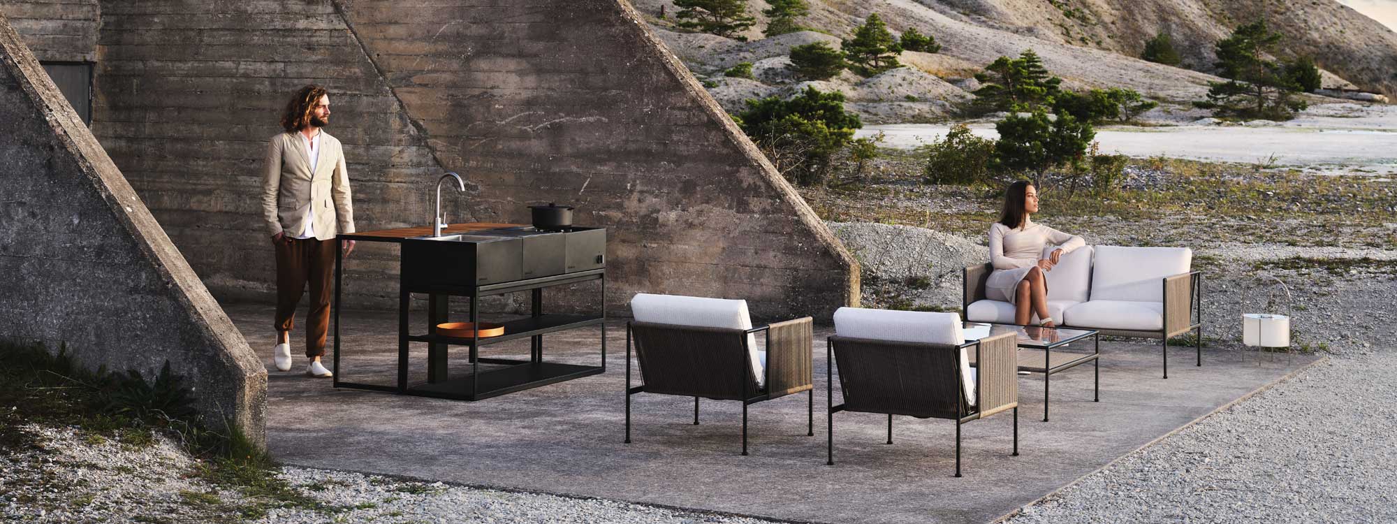 Antibes outdoor lounge set includes a garden easy chair, a 2 seat garden sofa & low tables by Roshults modern garden furniture - Sweden.