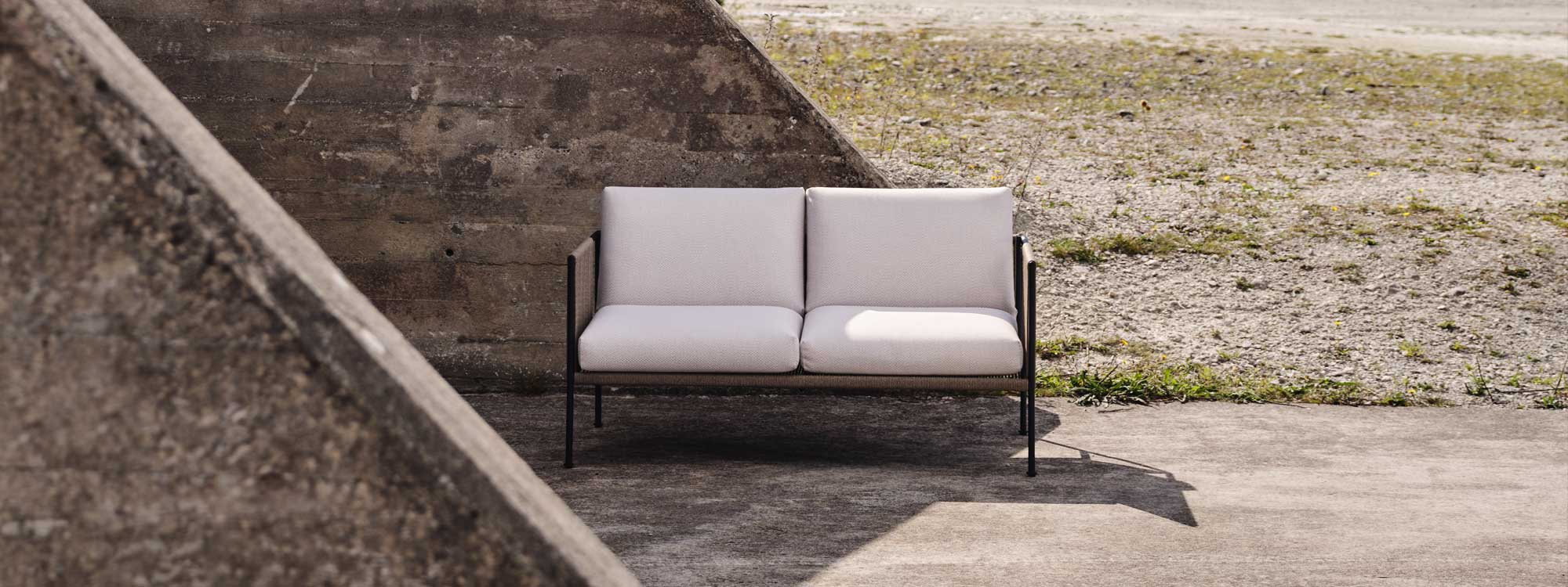 Antibes outdoor lounge set includes a garden easy chair, a 2 seat garden sofa & low tables by Roshults modern garden furniture - Sweden.