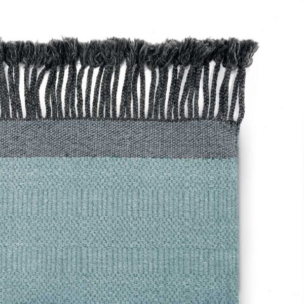 Image of detail of fringe of Atlas modern outdoor rug range & designer garden carpets in all-weather carpet materials by RODA luxury garden furniture, Italy.