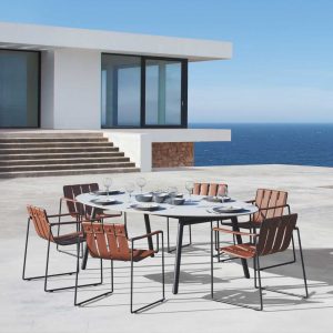 Strappy garden dining chair is a modern outdoor carver chair in minimalist outdoor furniture materials by Royal Botania luxury exterior furniture