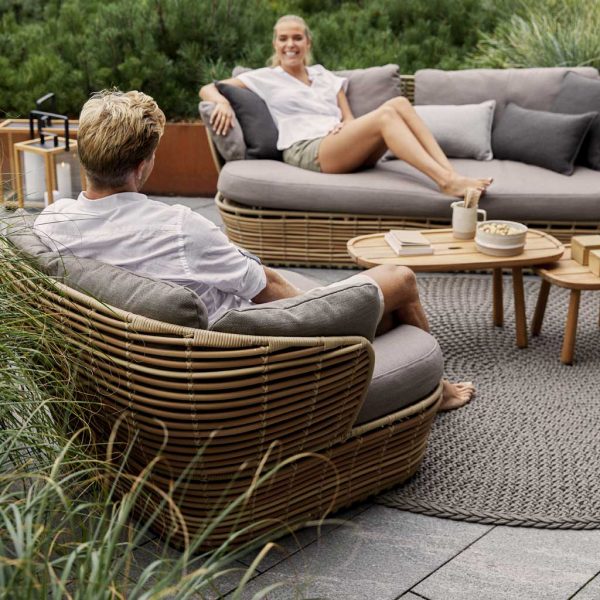 Image showing skillfully hand-woven back of Cane-line Basket outdoor lounge chair with taupe cushions