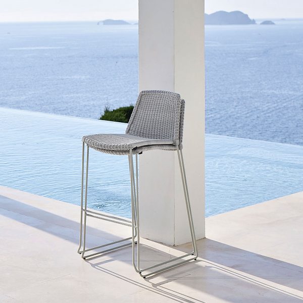 Stacked Light Grey Breeze modern bar stool is a contemporary outdoor bar chair in luxury quality garden furniture materials by Cane-Line modern garden furniture company