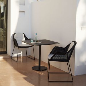 Black Breeze modern outdoor dining chair is a designer garden chair in high quality garden furniture materials by Cane-line luxury garden furniture