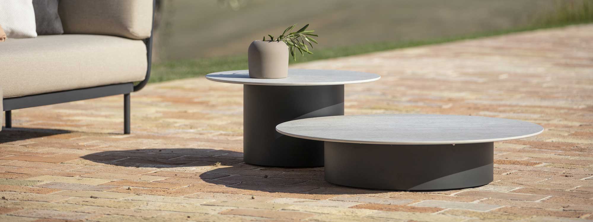 Branta exterior low tables have modern design by Studio Segers for Todus luxury outdoor furniture company